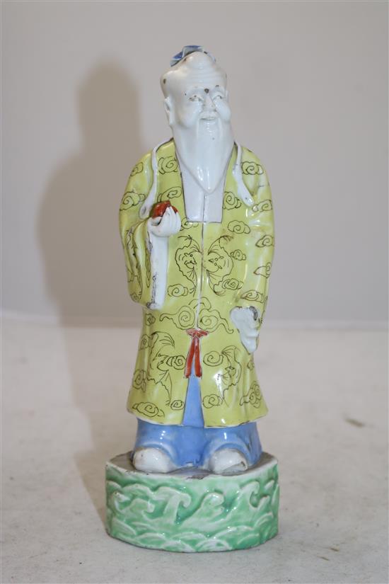 A Chinese enamelled porcelain figure of Shou Lao, 18th/19th century, height 22cm